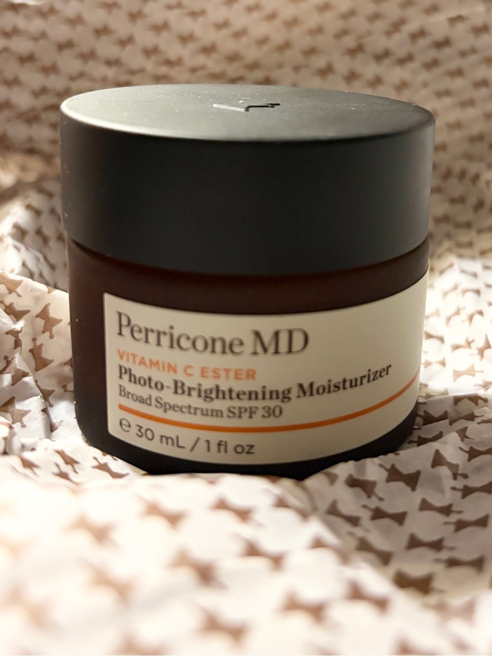 Perricone MD Photo-Brightening Moisturizer in Brown and White with Orange Accent
